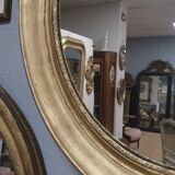 Miroir ovale en bois doré 93x73cm