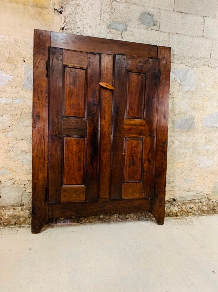 Old wooden doors of a Savoyard wardrobe chalet mountain vintage