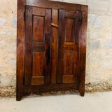 Old wooden doors of a Savoyard wardrobe chalet mountain vintage