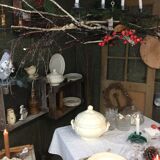 Old ivory-colored, oval-shaped dish with chamfered edge