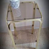 Golden side table and smoked glass