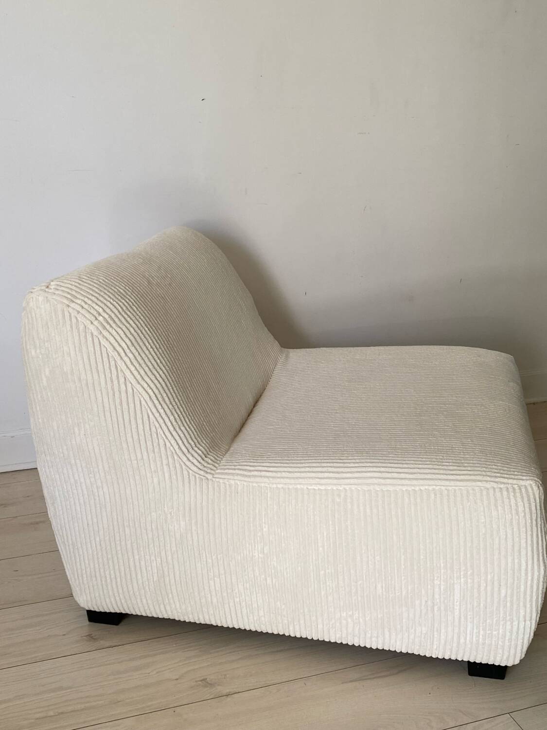 White corduroy armchair