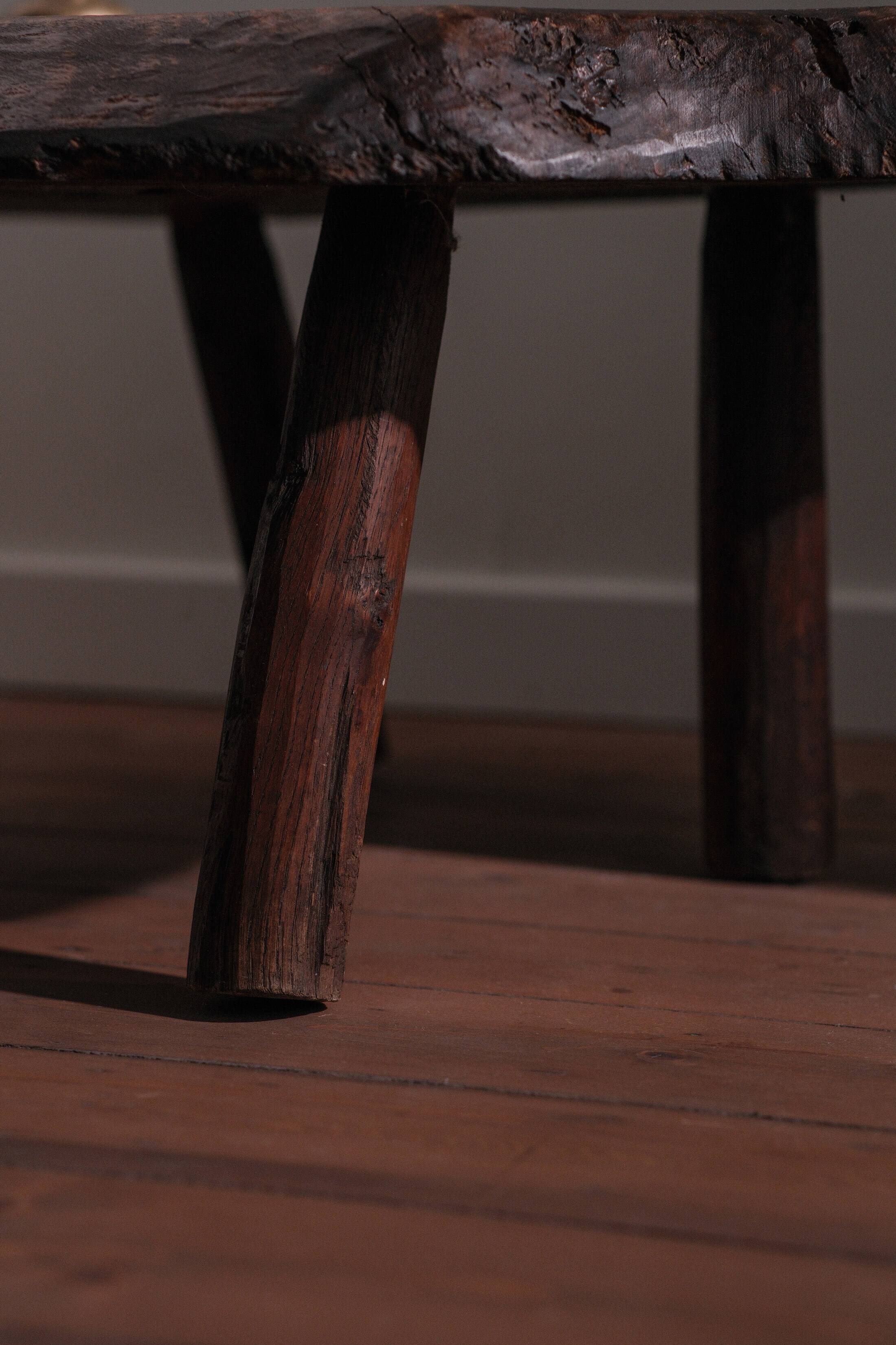 Coffee table in solid wood with organic shape