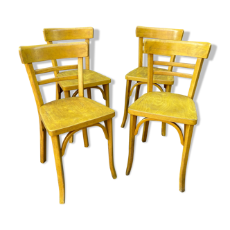 Set of 4 vintage-stamped baumann chairs