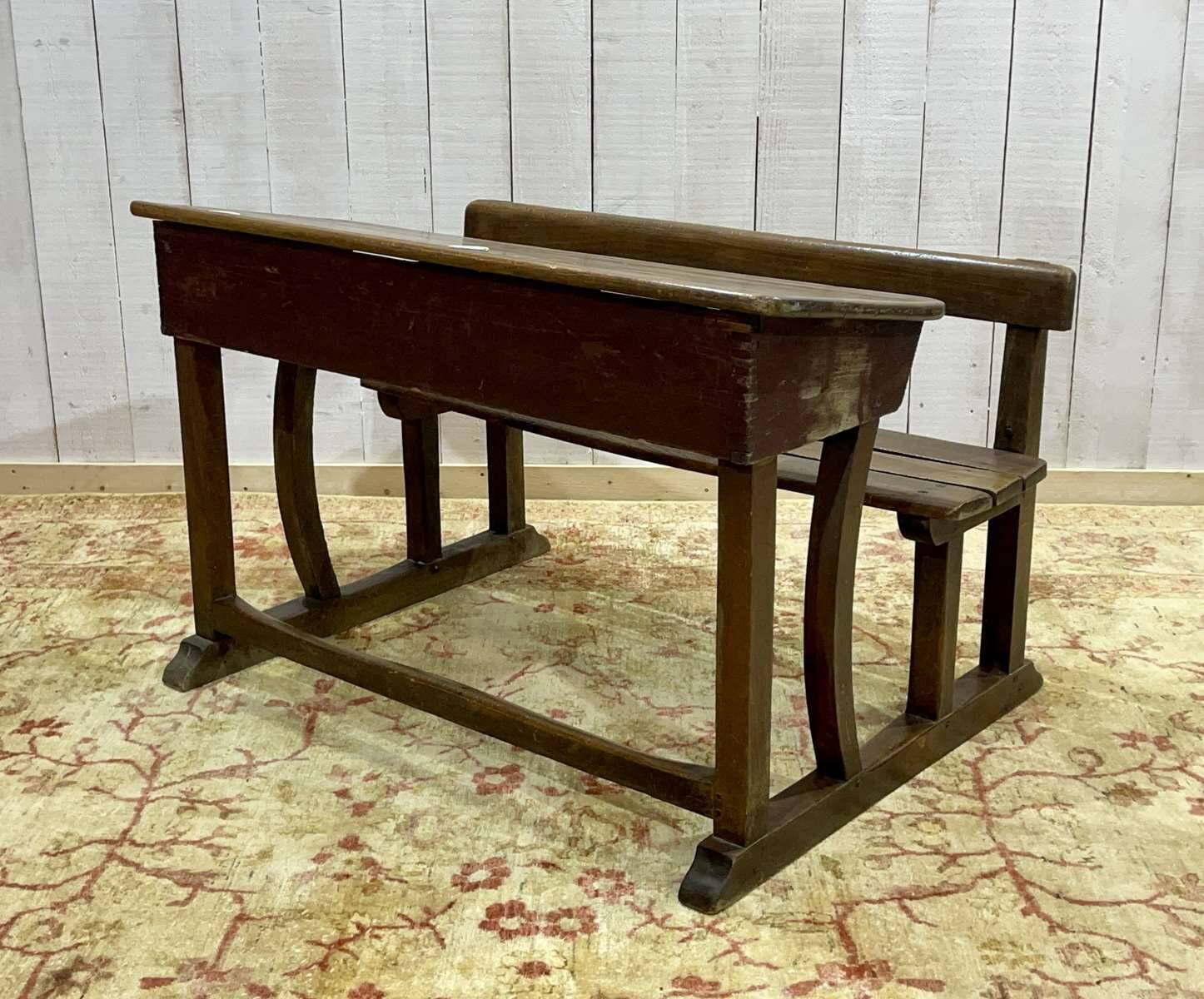 Early 20th-century oak school desk with porcelain inkwells
