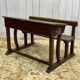Early 20th-century oak school desk with porcelain inkwells