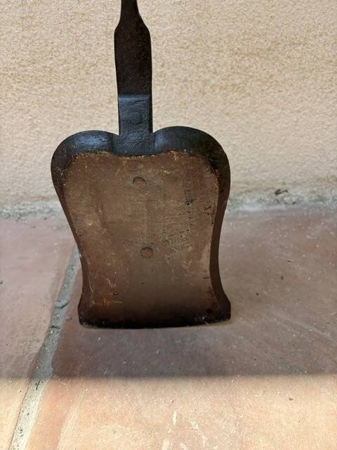 Large fireplace tongs and shovel from the 19th century.