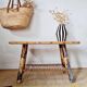 Table basse en rotin plateau tissu fleuri jaune
