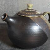 Vintage enameled stoneware potter's teapot