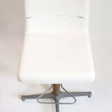Workshop stool with backrest and footrest from the 60s.