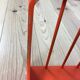 Space age wall coat rack, orange wood, with its shelf from the 1970s.