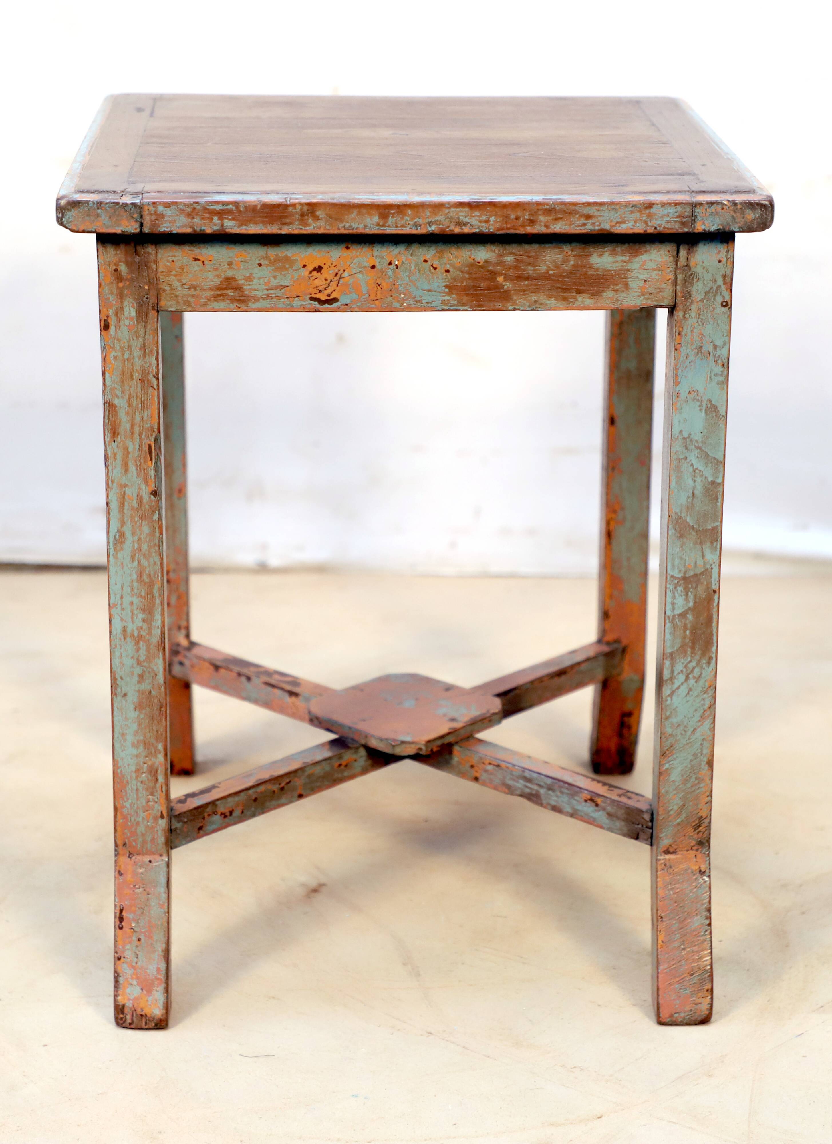 Burmese teak sofa end with original green patina