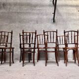 Series of 7 old bar cane cane bistro chairs
