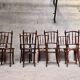 Series of 7 old bar cane cane bistro chairs