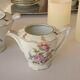 Sugar bowl and milk jar in flowery white porcelain