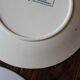 Set of 4 mismatched blue flat plates