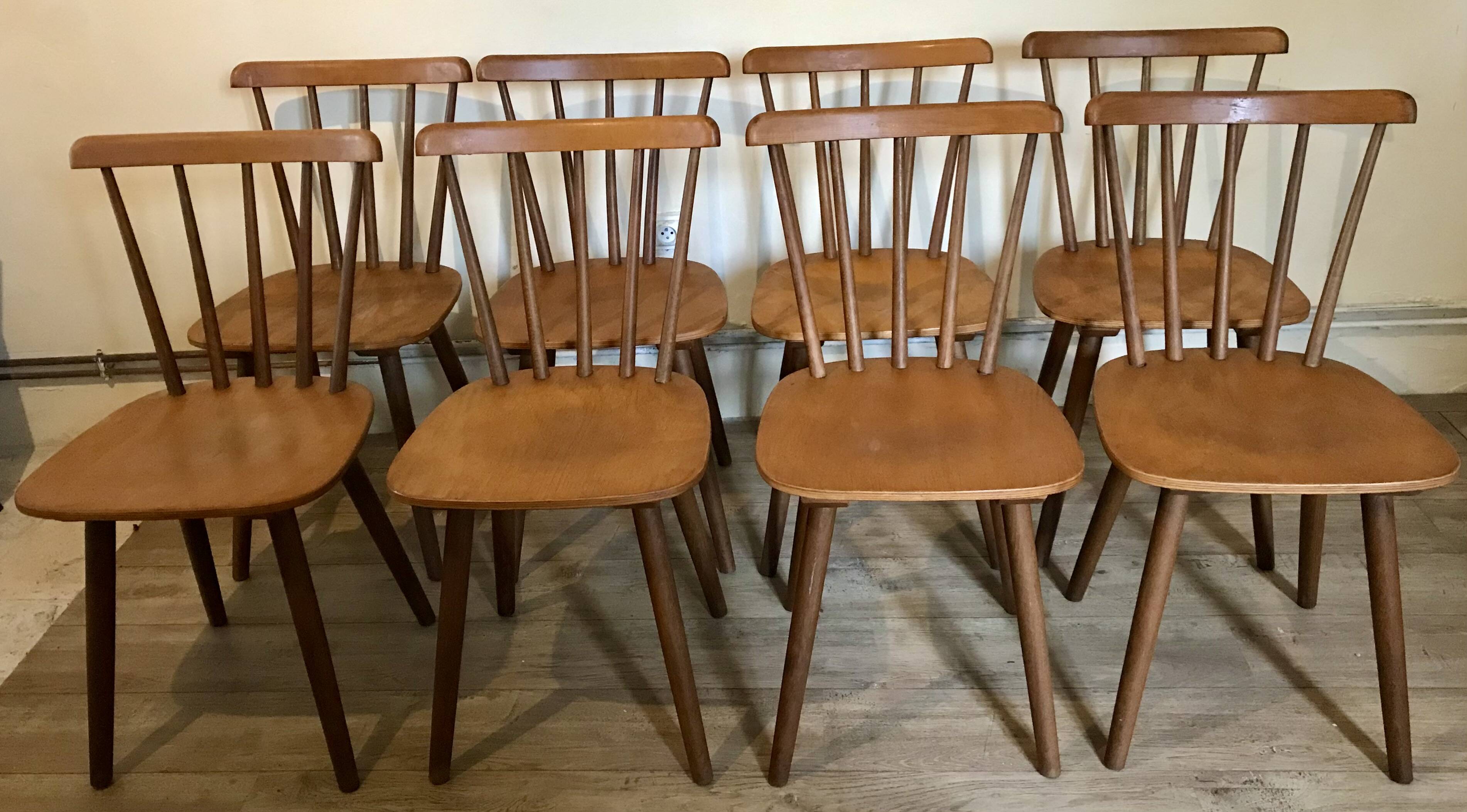 Set of 8 vintage chairs with bars and compass legs 1960