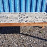 Teak dining table with illustrated top