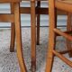 Set of 7 mismatched bistro chairs