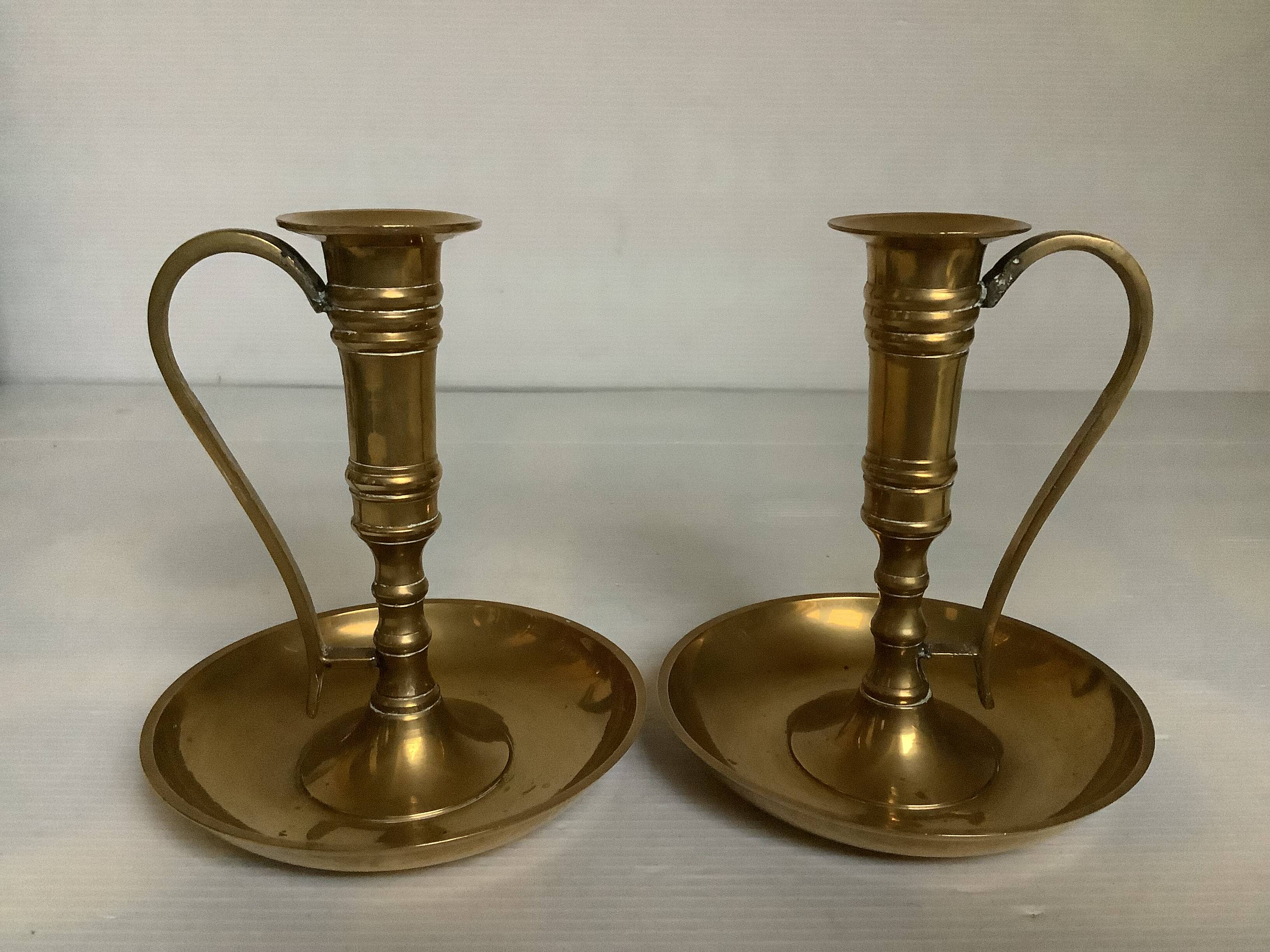 Pair of brass cellar rat candlesticks
