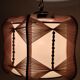 Raffia and wood ceiling lamp. Spain, 1970s.