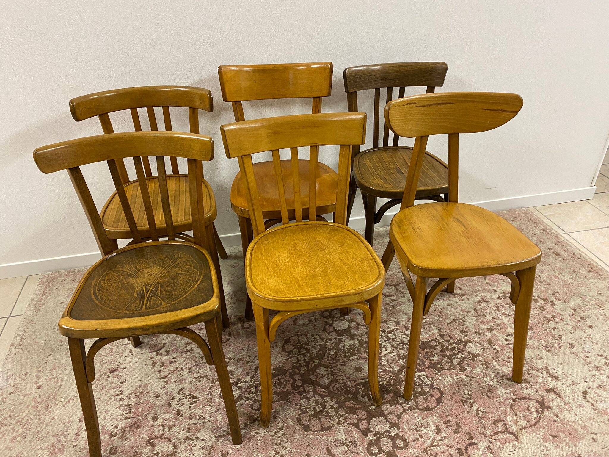 Set of 6 mismatched bistro chairs including Baumann and Luterma chairs