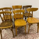 Set of 6 mismatched bistro chairs including Baumann and Luterma chairs