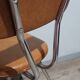 Pair of vintage faux leather and chrome chairs