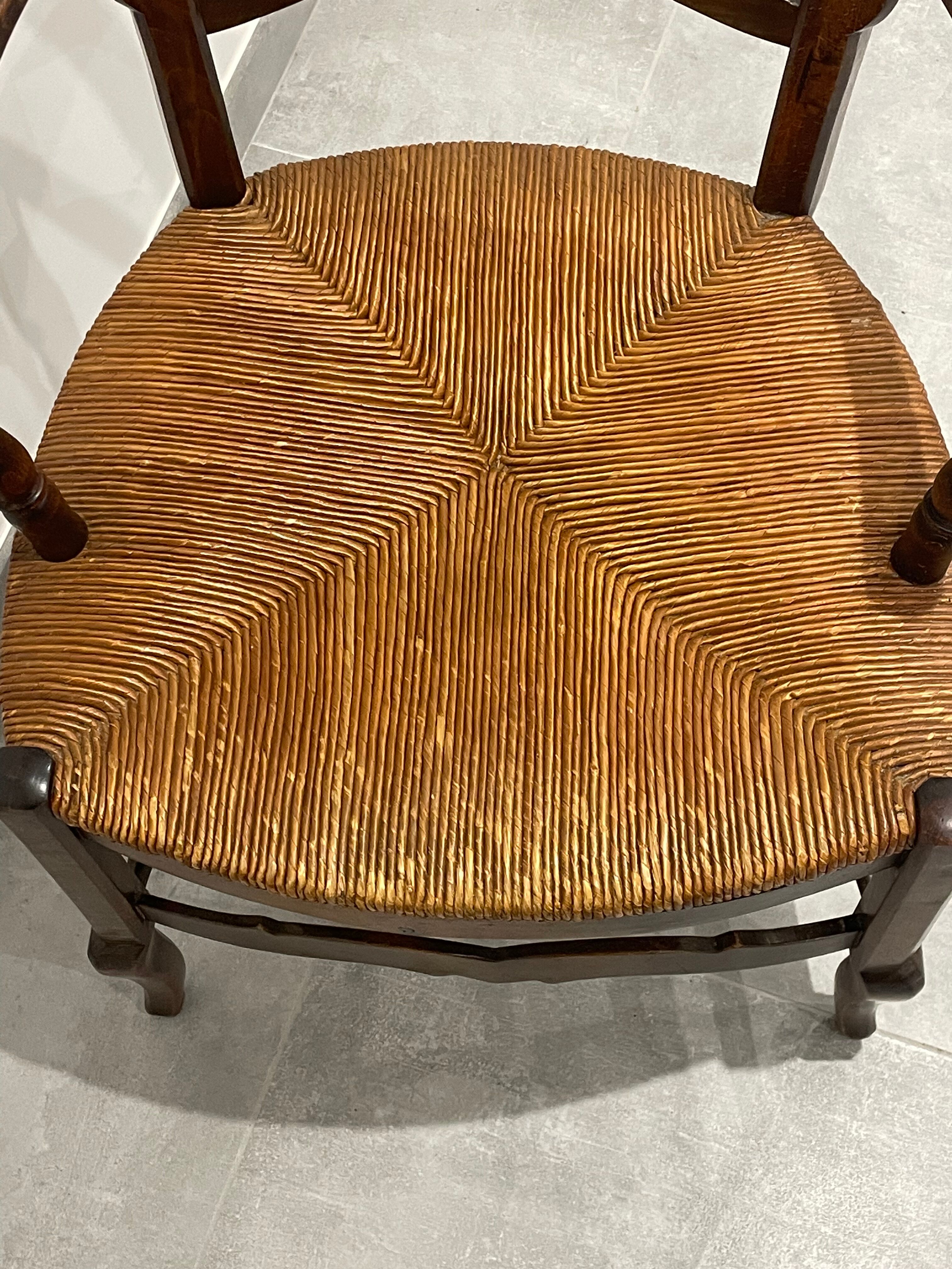 Provencal style straw armchair sometimes called marsh armchair