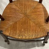 Provencal style straw armchair sometimes called marsh armchair