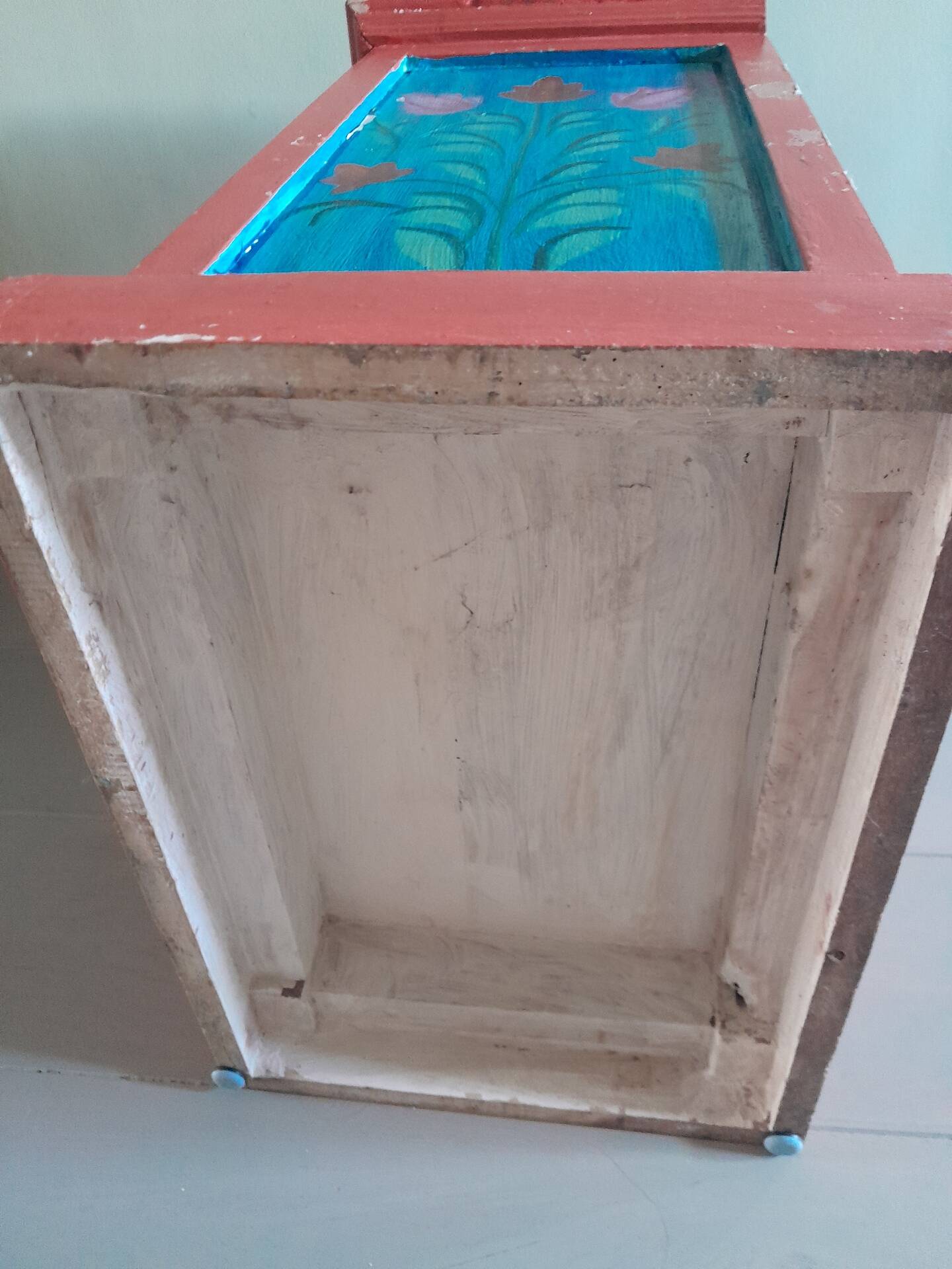 Painted wooden piece of furniture