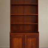 Rare high cabinet in teak by Martin Nyrop for Rud. Rasmussen, Denmark, early 20th century.