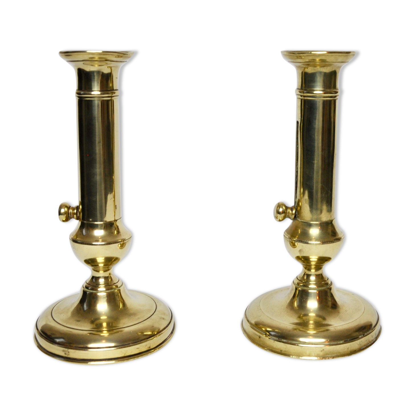 2 adjustable brass candlesticks