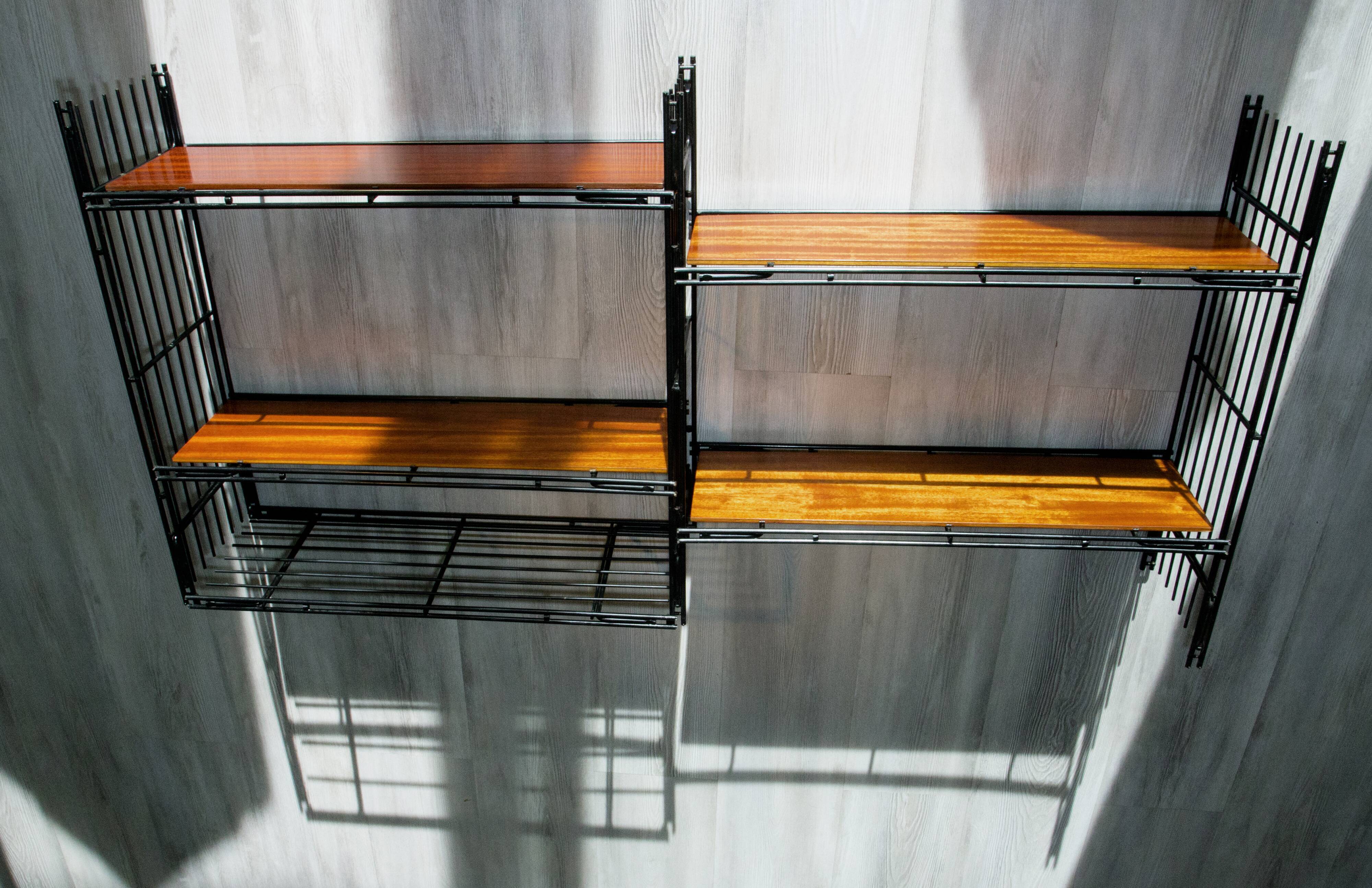Modular shelves on wall or stand, published by Multimueble 1960