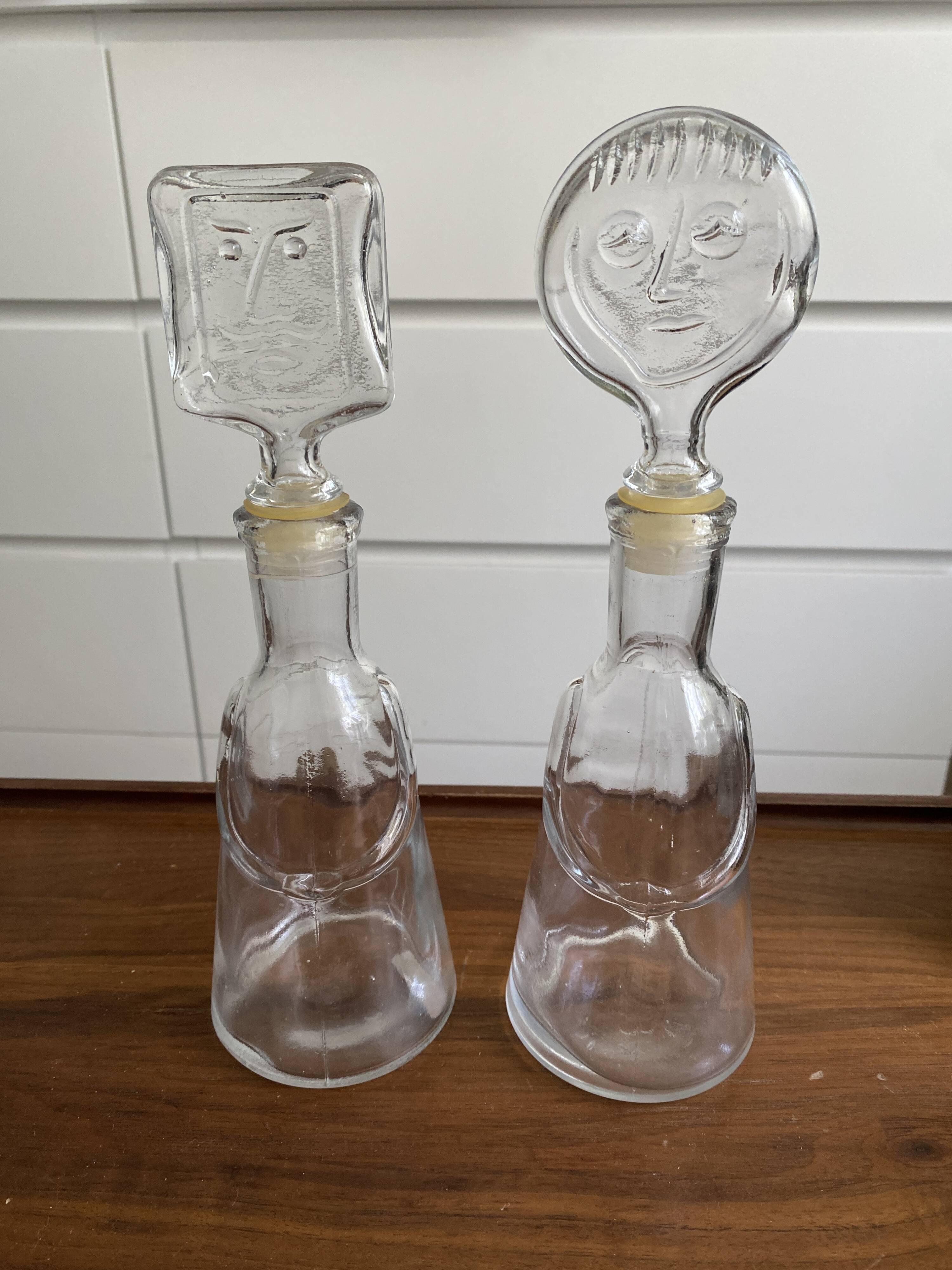 Pair of decanters by Erik Hoglund for Neiman Marcus, "People" series, Kosta Boda