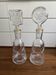 Pair of decanters by Erik Hoglund for Neiman Marcus, "People" series, Kosta Boda