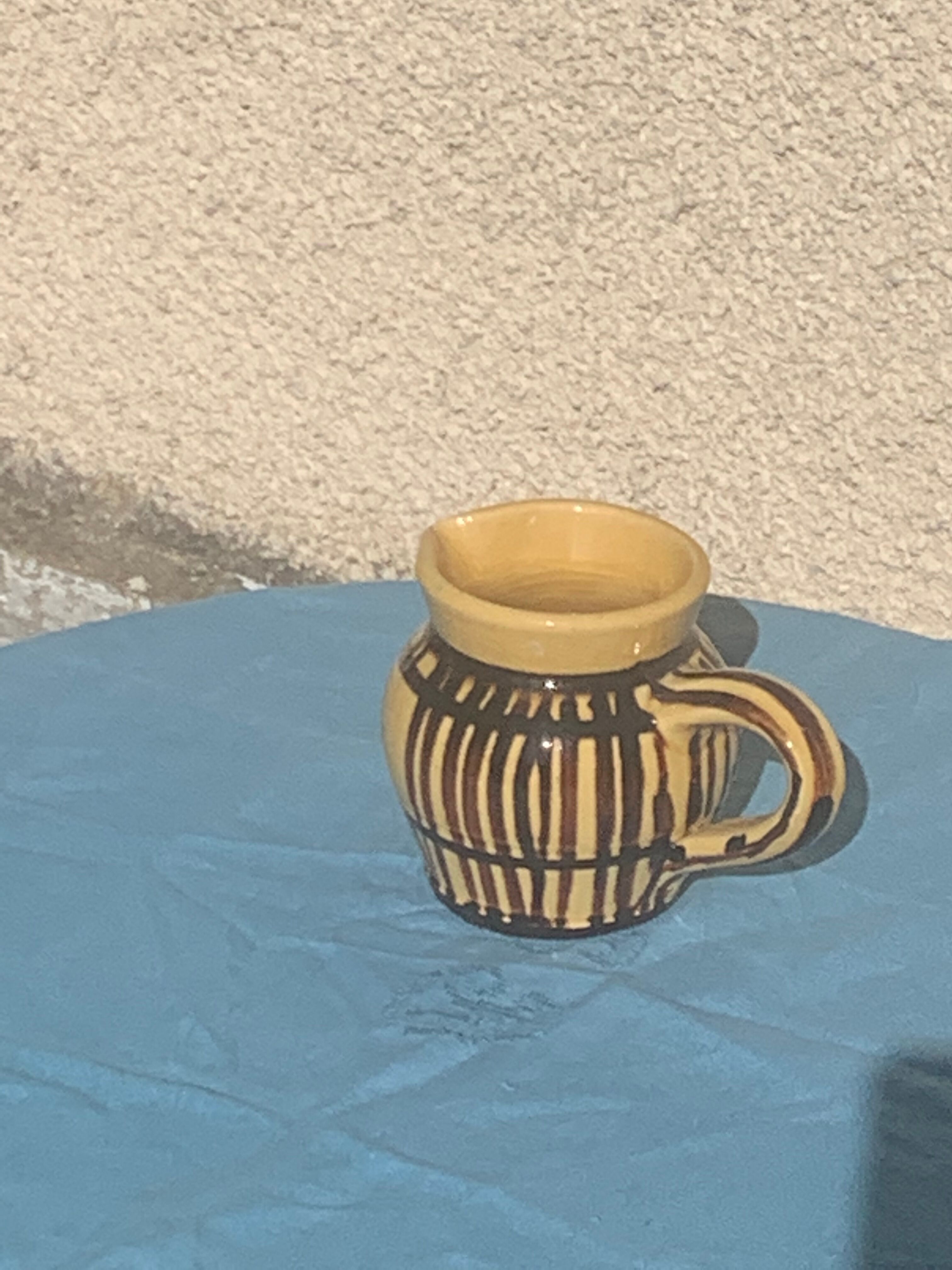 Vintage prince henry enamelled ceramic pitcher