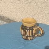 Vintage prince henry enamelled ceramic pitcher