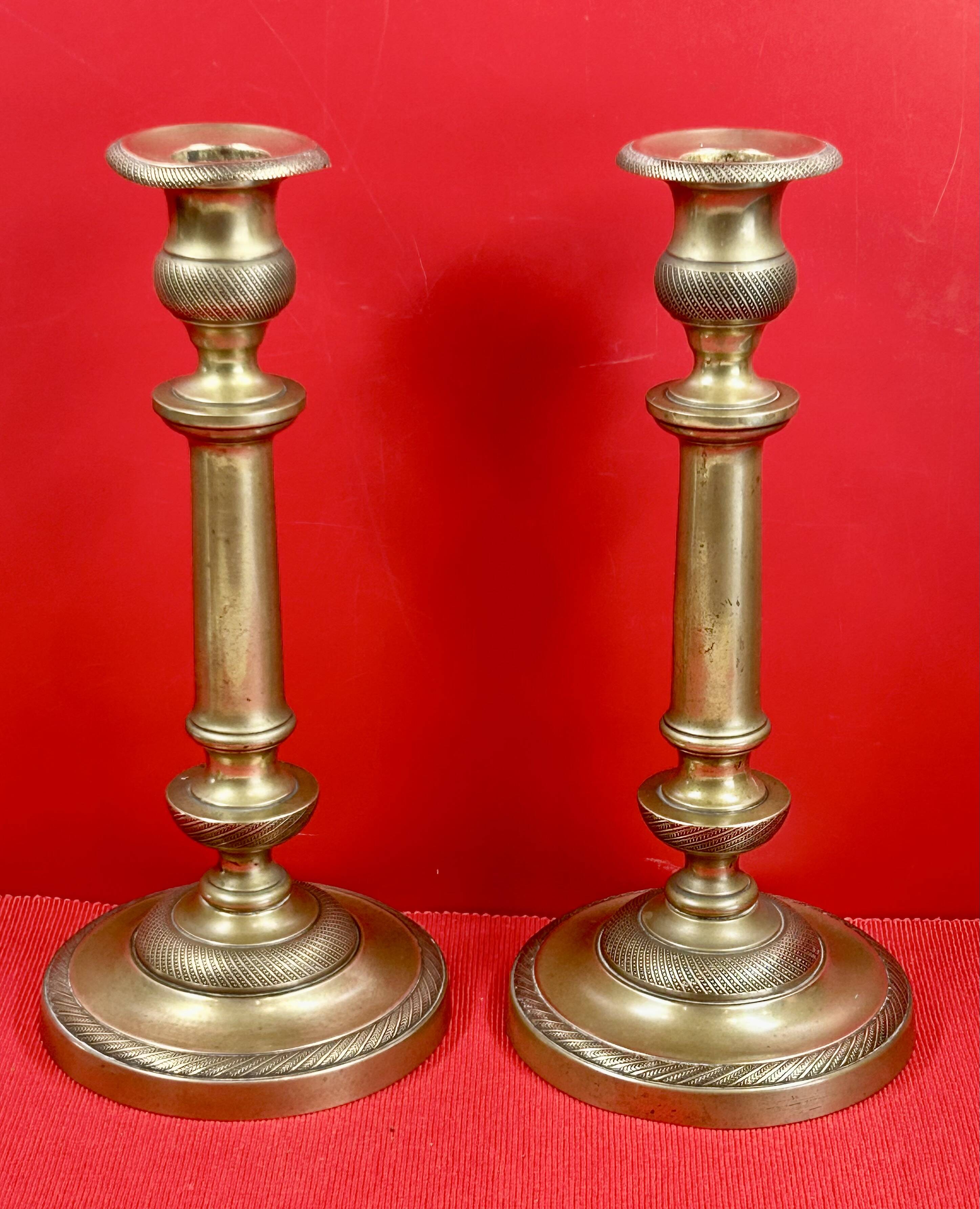 Pair of 19th-century restoration candlesticks in guilloché bronze - H 27 cm