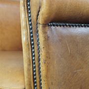 Stately, sleekly finished, comfortable sheepskin armchair