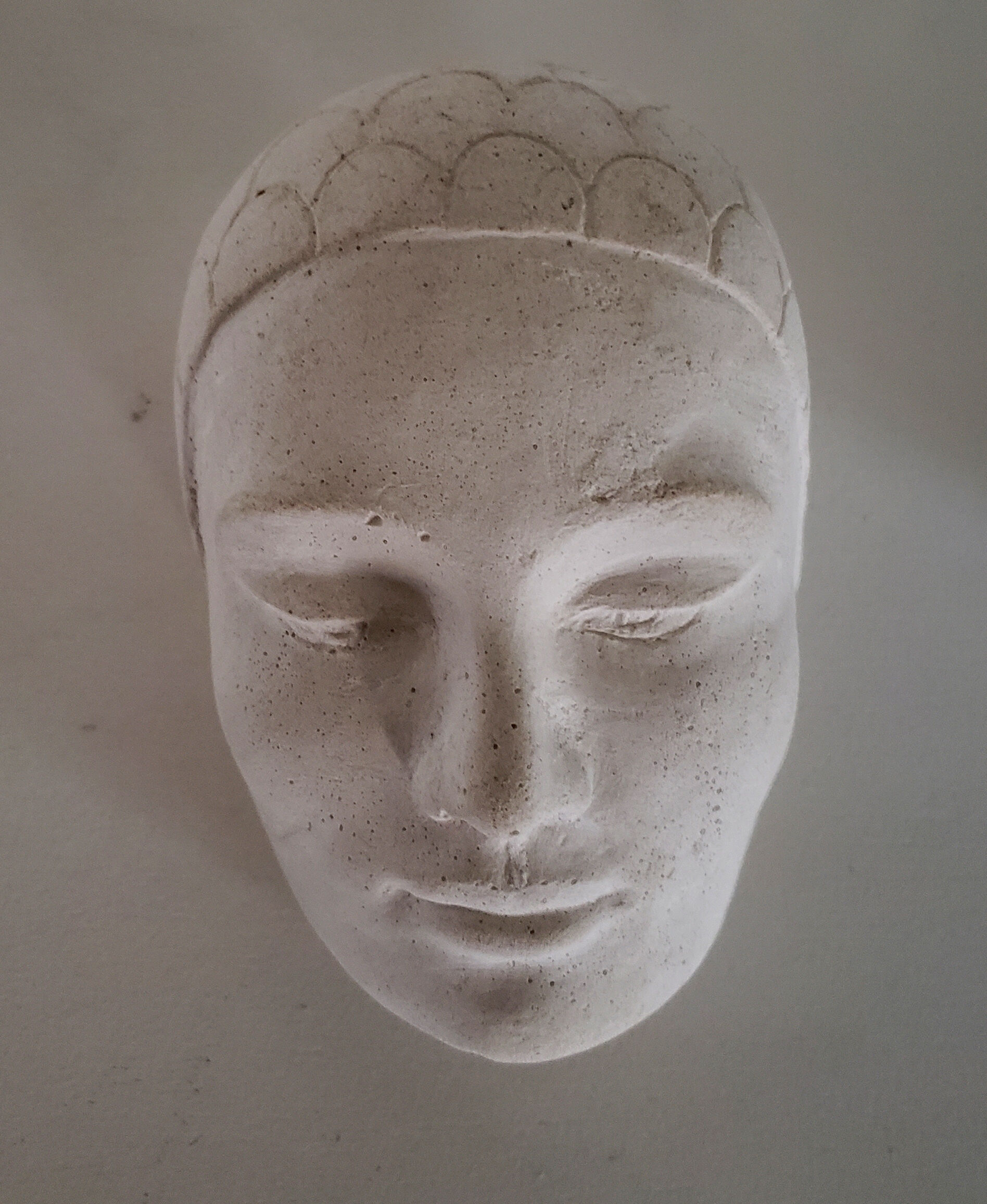 Plaster art-deco woman's head
