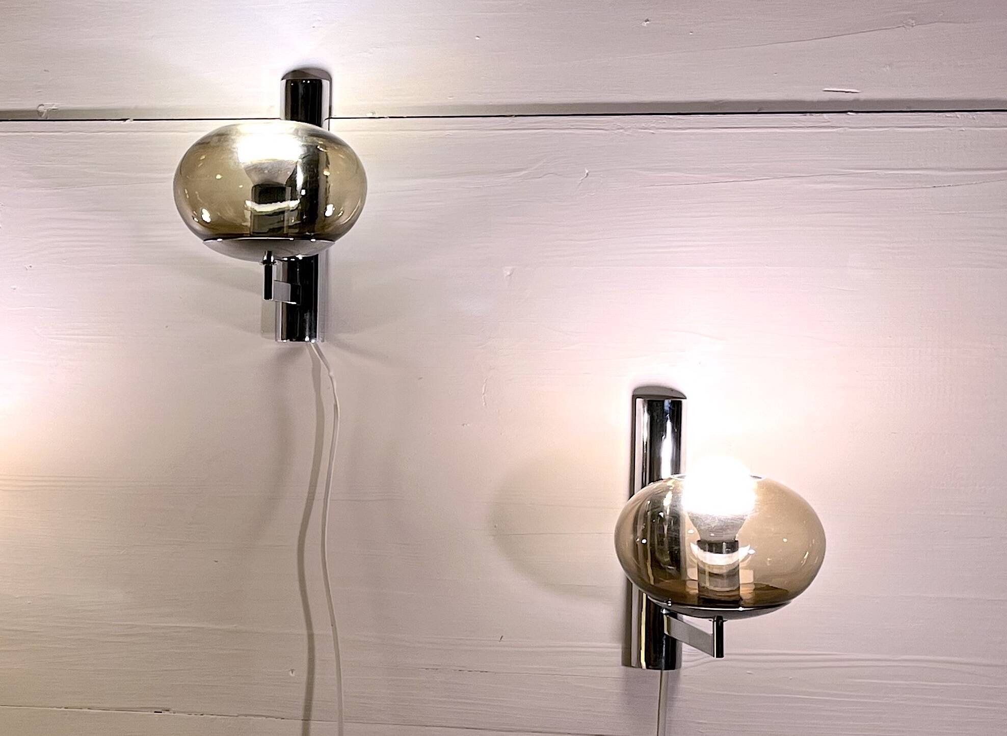 Sciolari, pair of chrome wall lights, smoked glass, Italy, 1970s