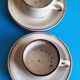 2 enameled stoneware espresso cups and saucers - France, 70s/80s