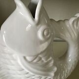 White ceramic vase in the shape of fish