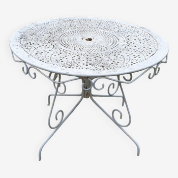 Ornate wrought iron garden table