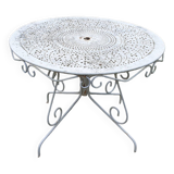 Ornate wrought iron garden table