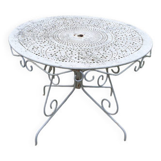 Ornate wrought iron garden table