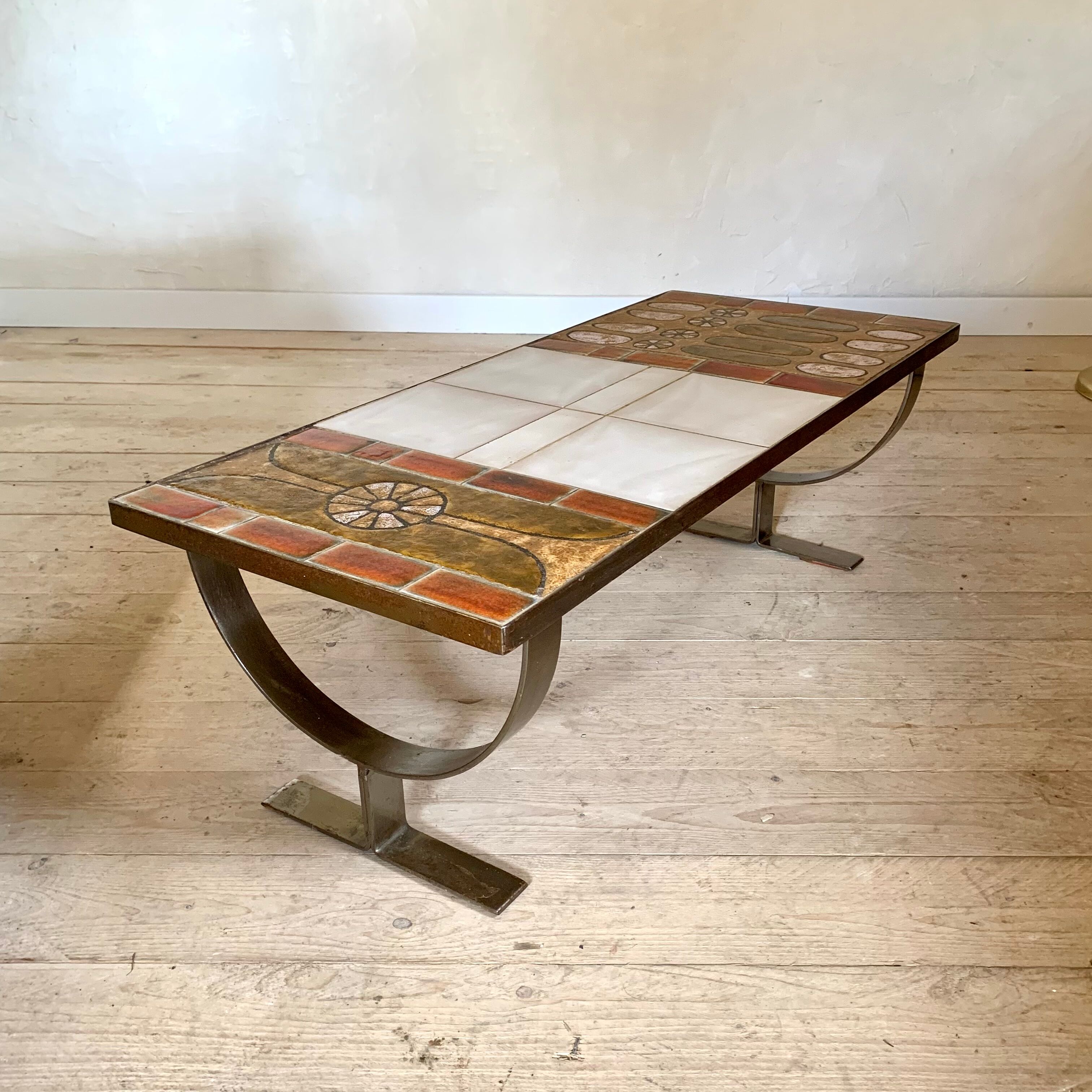 Ceramic coffee table and brushed steel by Jean Gregorieff