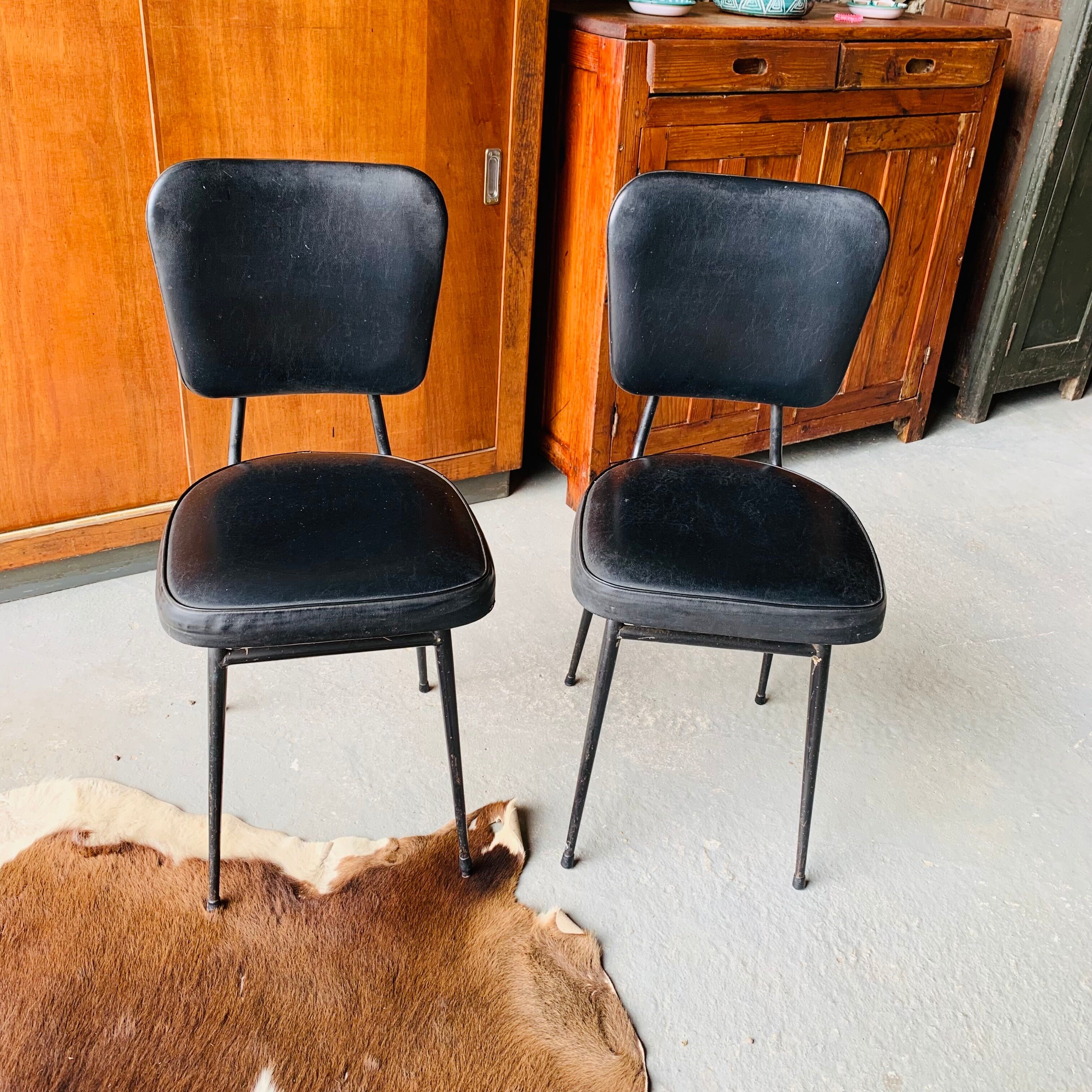 Pair of vintage black skai chairs