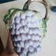 Pitcher bunch of grapes